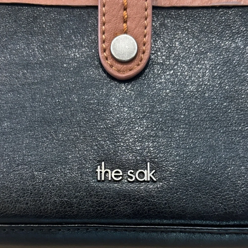 The Sak Large Smartphone Crossbody and Wristlet Leather Wallet Black and Brown